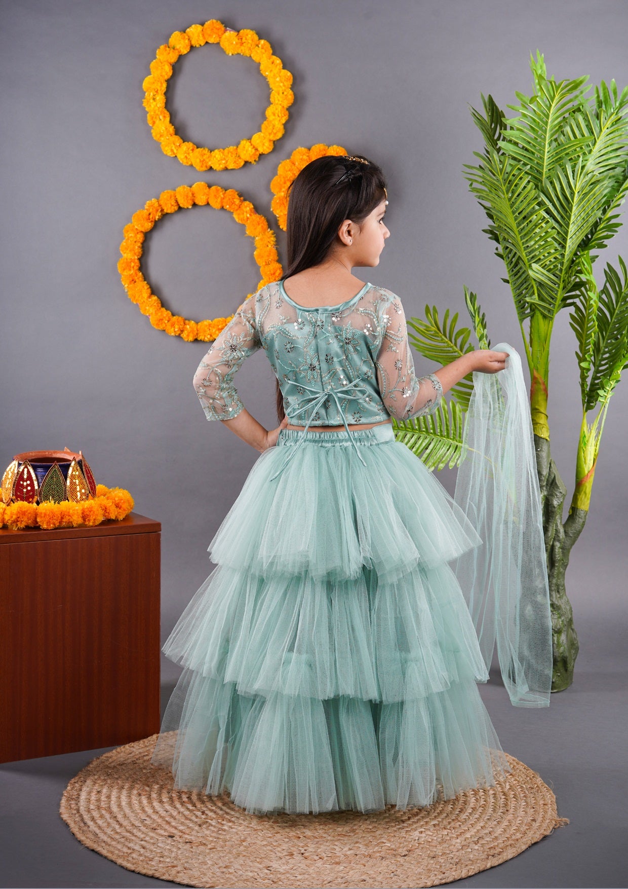 Titrit Pistachio Net lehenga with embroidered choli with dupatta