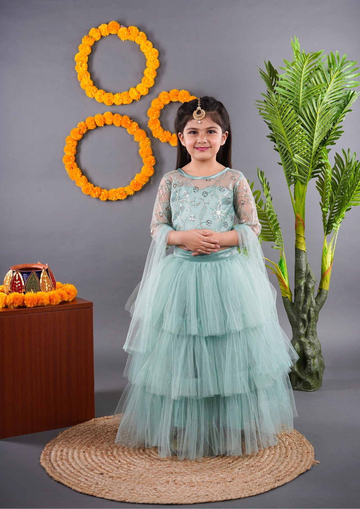 Titrit Pistachio Net lehenga with embroidered choli with dupatta