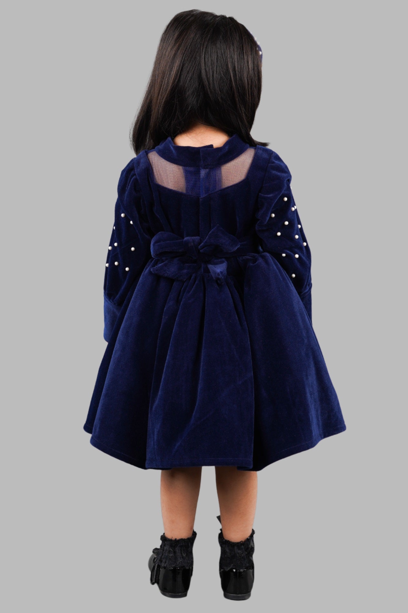 Titrit Solid Navy velvet frock with a hair band .