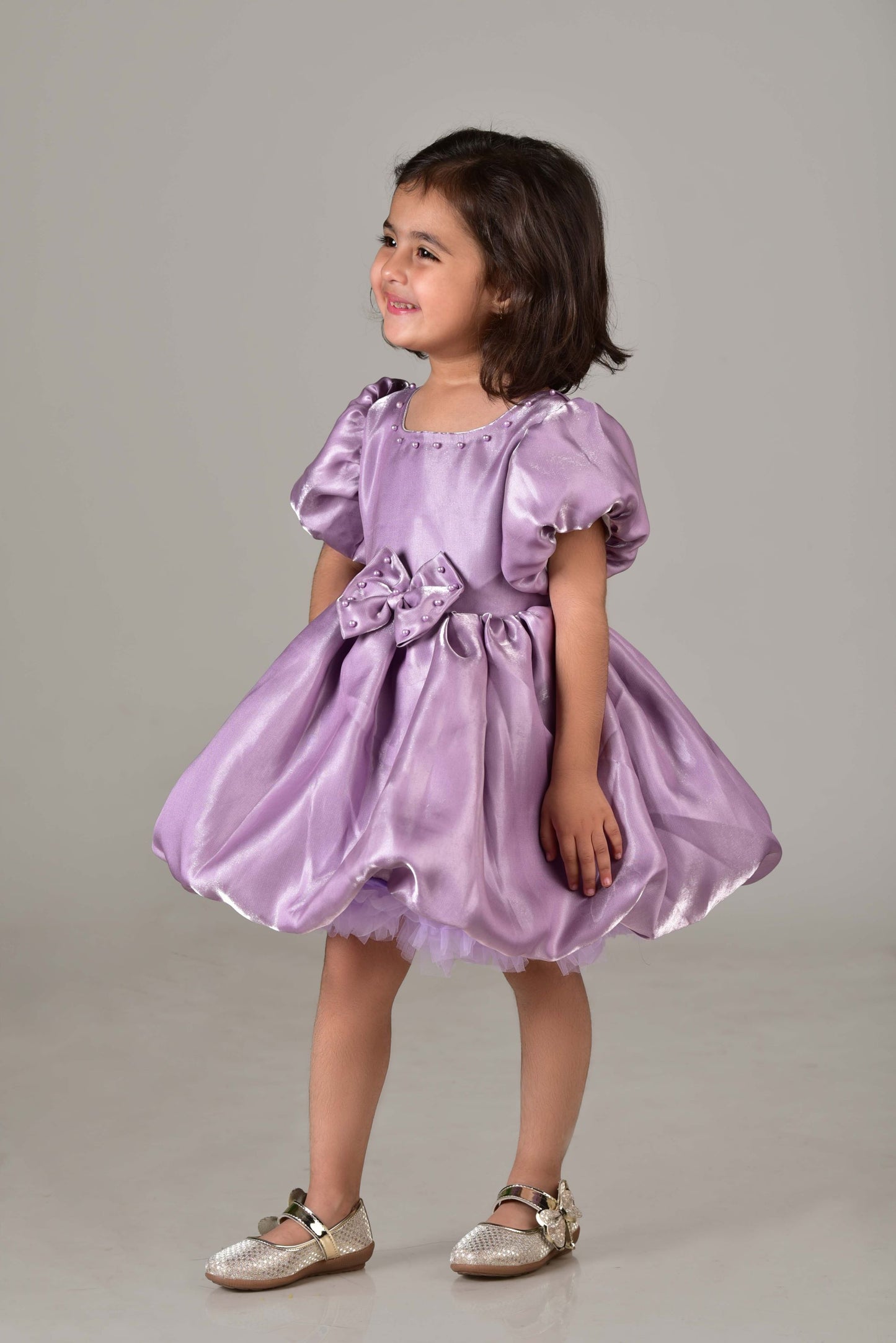 Purple party frock with puffy sleeves