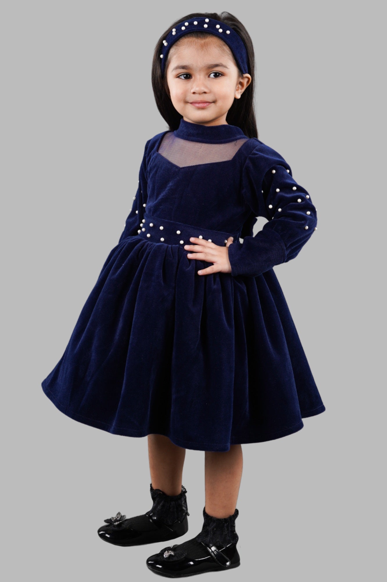 Titrit Solid Navy velvet frock with a hair band .