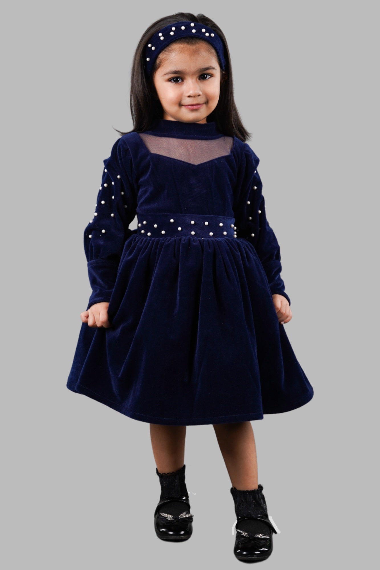 Titrit Solid Navy velvet frock with a hair band .