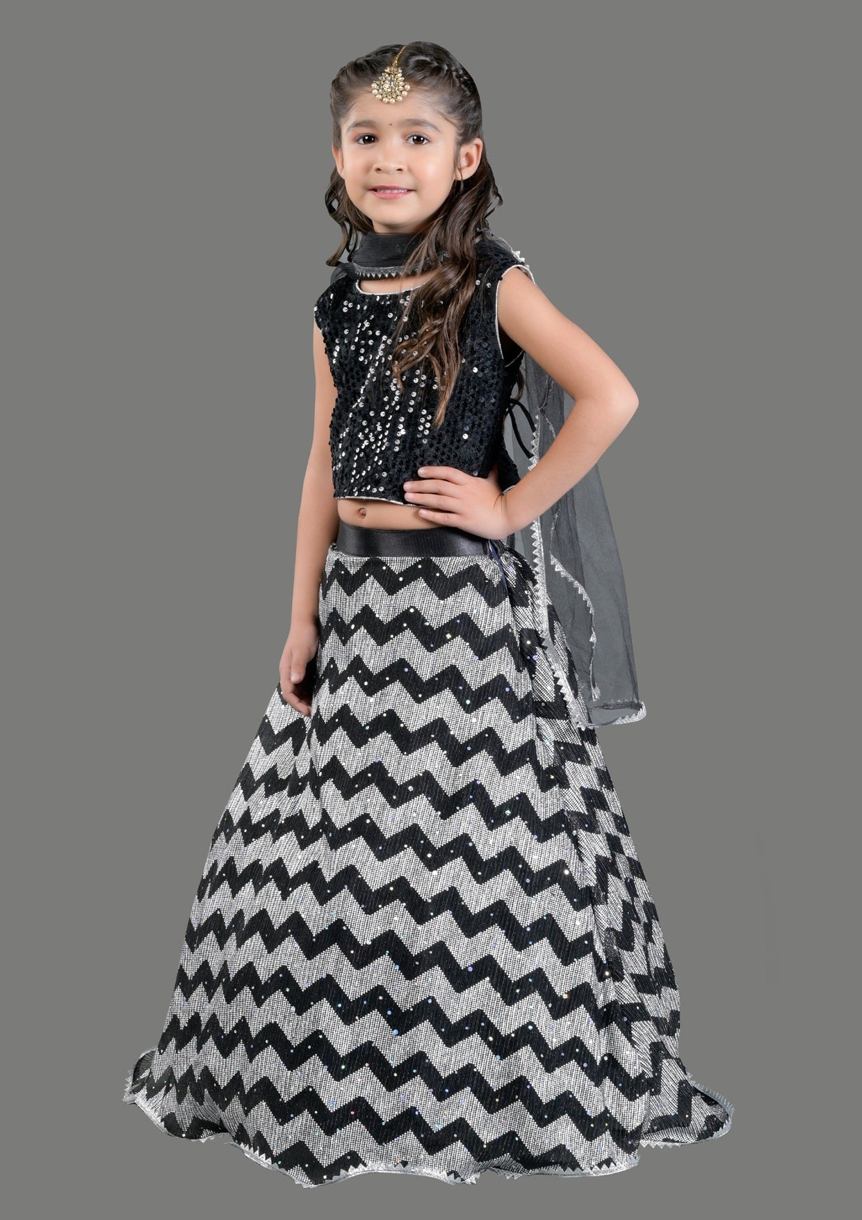 Titrit Black sequined lehenga with velvet sequined choli and a dupatta
